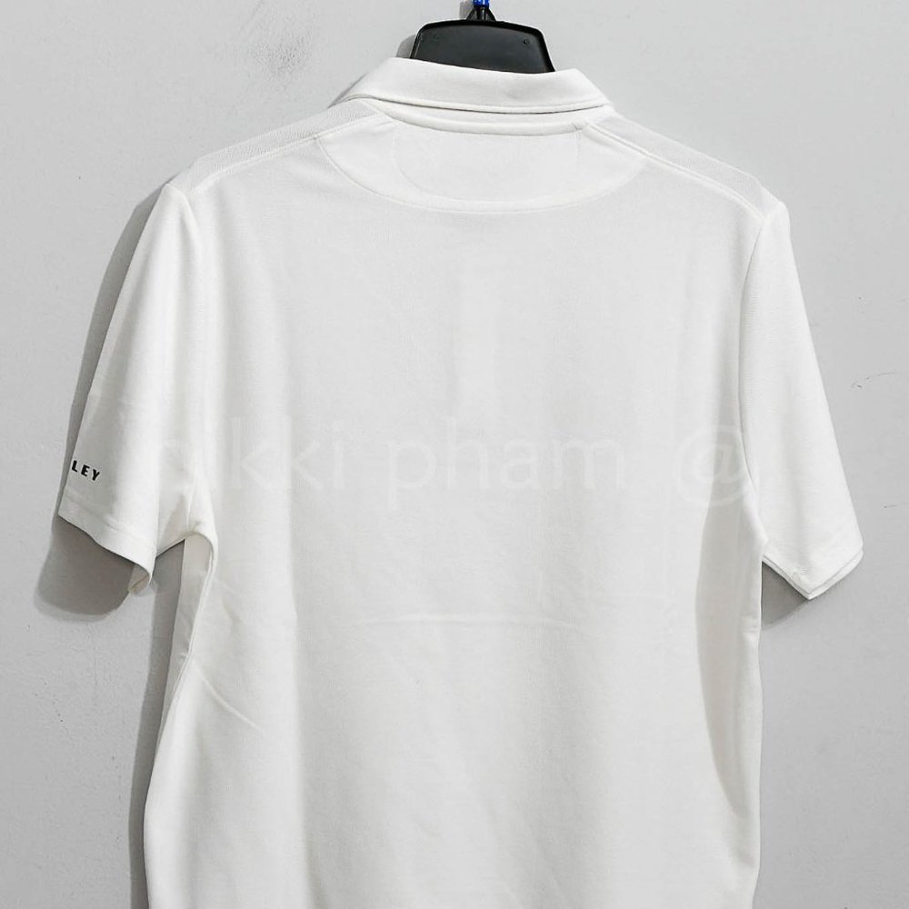 bran new Oakley Men's Clubhouse Rc Polo 2.0 in  white without the retail tag - Picture 4 of 4